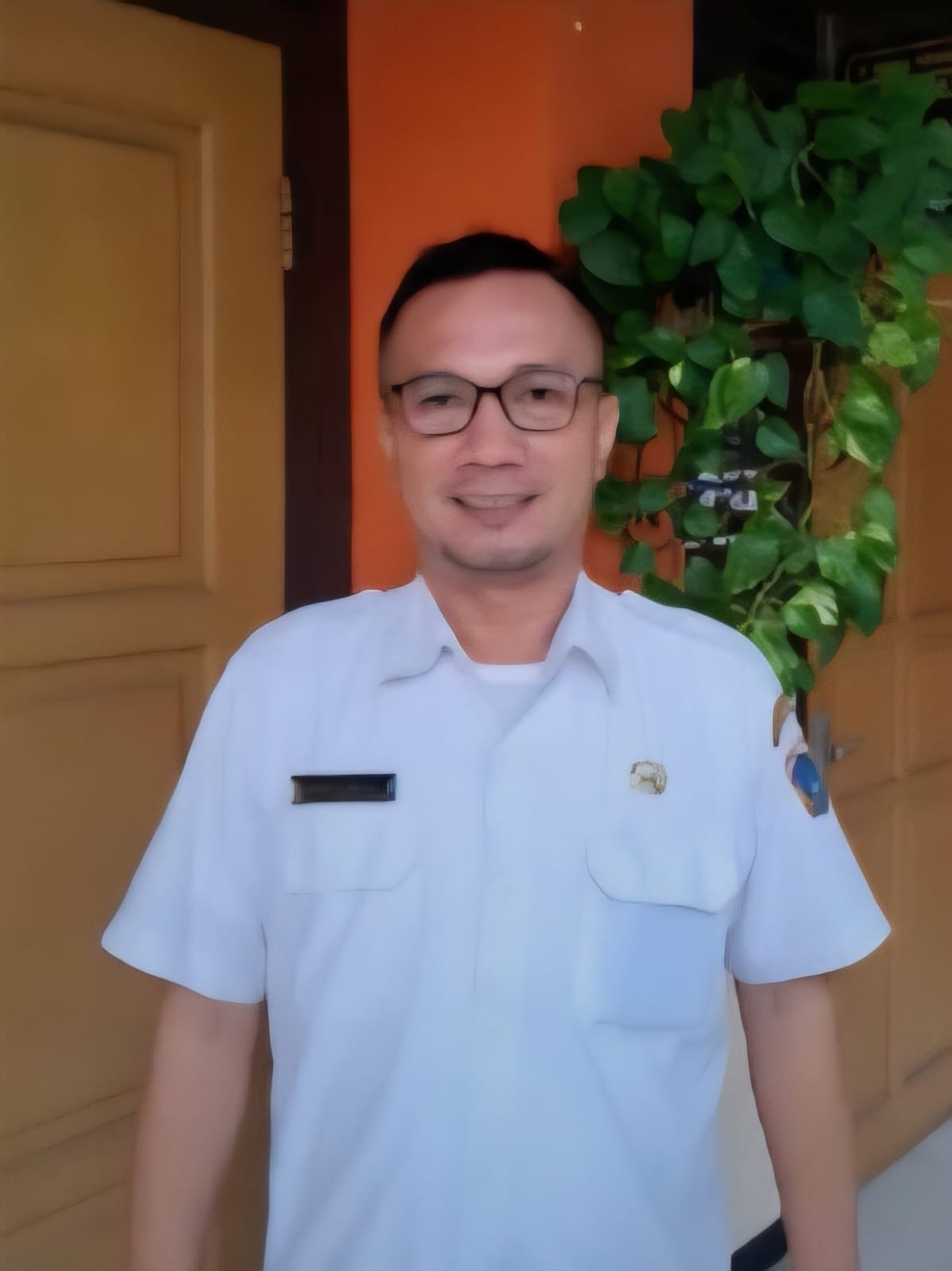 Martin Malau, S.Pd